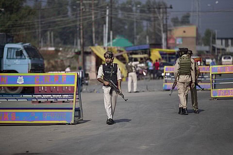 An Indian police man guards near a gun battle site on the outskirts of Srinagar, Sunday, Aug. 30, 2020. (Photo | AP)