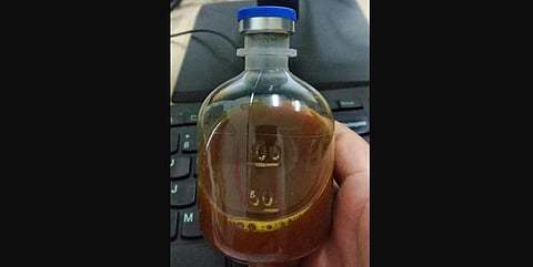 This August 2020, photo provided by a Uighur under quarantine shows a bottle of unidentified traditional Chinese medicine in Urumqi, China. (Photo | AP)