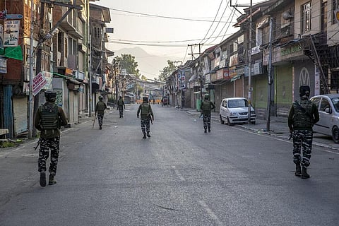 Indian paramilitary soldiers patrol a deserted street on the first anniversary of India’s decision to revoke the disputed region’s semi-autonomy, in Srinagar, Wednesday, Aug. 5, 2020. (Photo | AP)