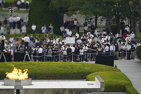 Visitors observe a minute of silence for the victims of the atomic bombing (Photo | AP)