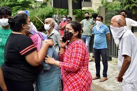 Kins of the victims react outside Shrey hospital after a major fire broke out in it in the wee hours in Ahmedabad Thursday Aug 6 2020.  (Photo | PTI)