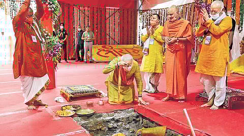 Prime Minister Narendra Modi performs the ground-breaking ceremony of Ram Temple as RSS chief Mohan Bhagwat (right) looks on in Ayodhya. (Photo | AP)