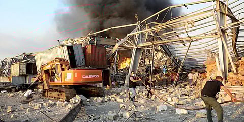 Lebanese firefighters work at the scene of an explosion in the Lebanese capital Beirut on August 4, 2020. (File Photo | AFP)