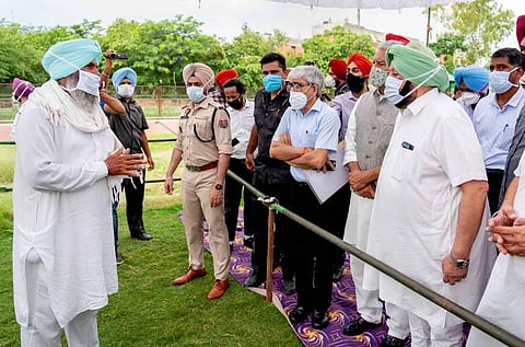 Punjab Chief Minister Captain Amarinder Singh meets the families of the victims of hooch tragedy that claimed 112 lives in Tarn Taran about 25 kms from Amritsar. (Photo | PTI)