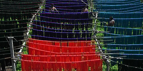 A handloom weaver at work in Mangalgiri on Friday. (Photo| Prasant Madugala, EPS)