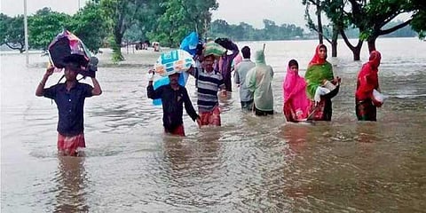 The deluge has swamped 1,232 panchayat areas in 125 blocks of 16 districts. (Photo | PTI)