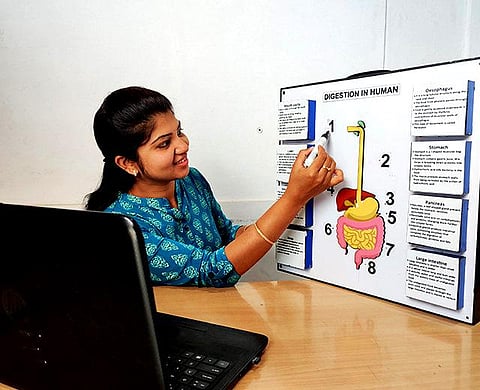 An educator preparing a slide as part of the Kidvento online training programme for schoolchildren. (Photo | Express)