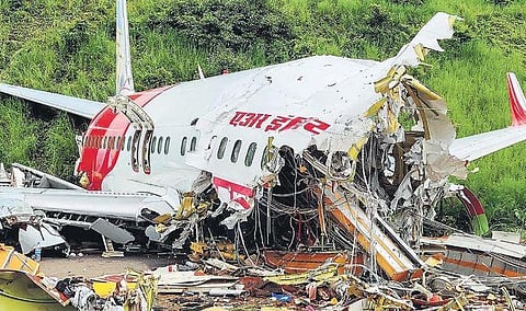 Mangled remains of the AI Express that crash-landed at Kozhikode airport | pti