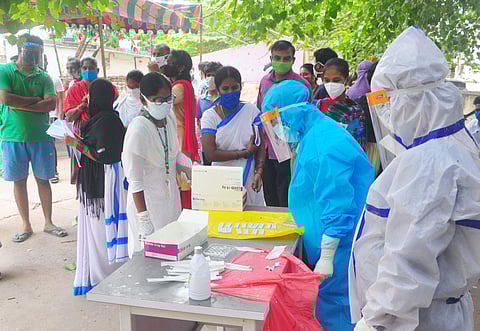 A health worker sorting the samples collected at the Rapid Test Camp in Visakhapatnam on Monday. (Photo| EPS/G Satyanarayana)