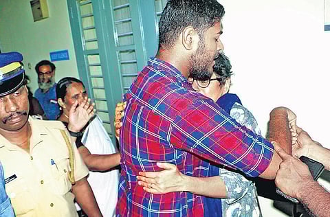 Alan Shuhaib’s mother Sabitha Sekhar hugs him on the premises of Kozhikode Sessions Court in November last year | File Pic