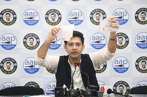 AAP leader Raghav Chadha tears up notice issued by centre that threatened slum dwellers that their houses will be demolished (Photo | Twitter)