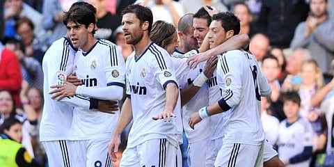Mezut Ozil alongside Kaka, Xabi Alonso and other Real Madrid teammates. (File Photo | AFP)