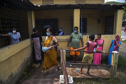 People wait to give their nasal swab samples to test for COVID-19 in Gauhati, India, Thursday, Sept. 10, 2020. (Photo | AP)