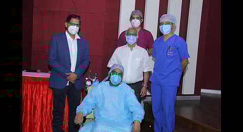 The patient with the medical team.