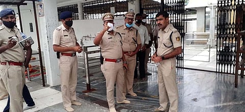 Police conducting a probe at the temple