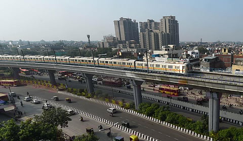 A metro train leaves Azadpur metro station after Delhi Metro resumed services. (Photo | EPS/Shekhar Yadav)