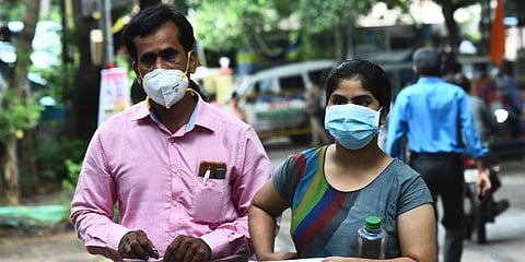 Students appearing for the NEET exam get ready for their exam outside the examination hall at a center in Adyar. (Photo| Ashwin Prasath, EPS)