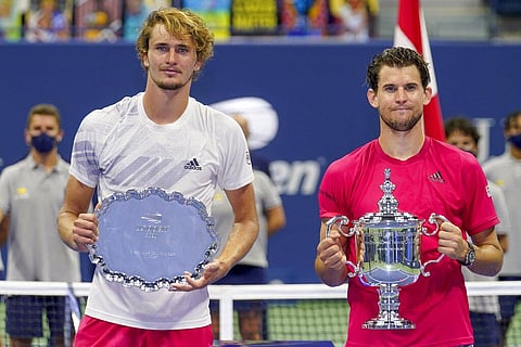Dominic Thiem, of Austria, right, and Alexander Zverev, of Germany, pose for photos after the men's singles final of the US Open tennis championships.(Photo | AP)