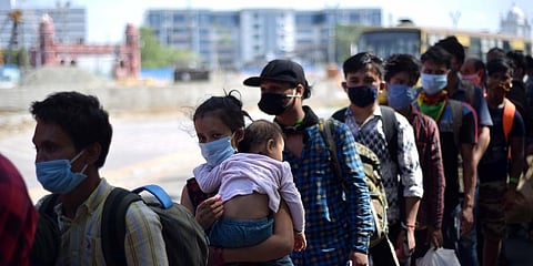 Migrant workers waiting to board Shramik special train to Bihar at Chennai Central Railway station. (Photo | R Satish Babu, EPS)