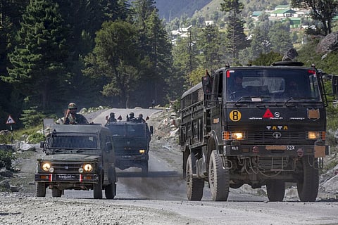 An Indian army convoy moves on the Srinagar- Ladakh highway at Gagangeer, northeast of Srinagar, Indian-controlled Kashmir, Wednesday, Sept. 9, 2020. (Photo | AP)