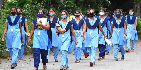 Students of Padmavati Degree College going to attend degree final semester exams at Tirupati. (Photo | Madhav K, EPS)