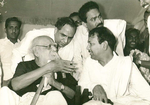 Former Tamil Nadu CM Karunanidhi listens carefully to Periyar. (File Photo | EPS)