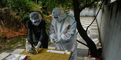 Telangana health staff segregating swab test results. (Photo | Vinay Madapu, EPS)