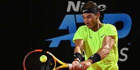 Spain's Rafael Nadal returns the ball to Serbia's Dusan Lajovic during their Italian Open tennis tournament match, in Rome. (Photo| AP)