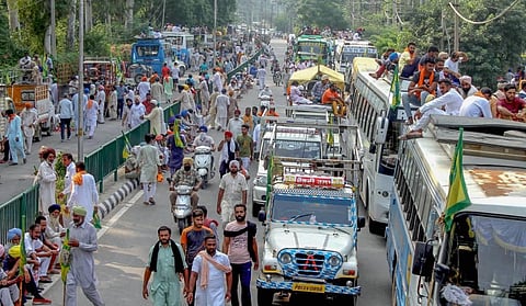 Members of various farmers' organisations protest over new electricity bill and agriculture related ordinances in Patiala Saturday Sept. 19 2020. (Photo | PTI)