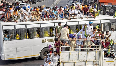 Members of various farmers' organizations on their way to stage a protest against the central government over agriculture related ordinances in Patiala Saturday Sept. 19 2020. (Photo | PTI)