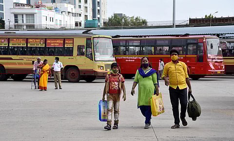Passengers waiting to board MTC bus at Koyambedu bus stand in Chennai. (Photo | R Satish Babu, EPS)