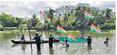 People living near the site of Alfa Serene, the twin towers  which were demolished at Maradu, protesting against the delay in removing the debris by standing in the waist-deep water  , Express