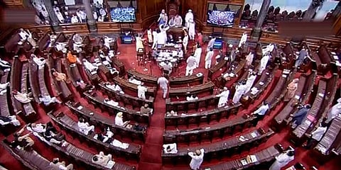 Ruckus erupts in the Rajya Sabha as Opposition rushes to Well of House over agriculture related bills during the ongoing Monsoon Session at Parliament House in New Delhi. (Photo | PTI)