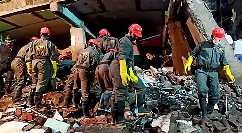 An eyewitness said local residents rushed to the spot immediately after the building collapse. (Photo | ANI)