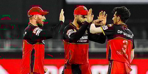 Yuvzvendra Chahal produced a crafty spell to set up a 10-run win for Royal Challengers Bangalore in their opening IPL contest against Sunrisers Hyderabad on Monday. (Photo | RCB Twitter)