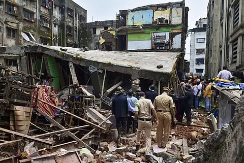 Fire brigade and police conduct search and rescue operation after a three storey building collapsed at Bhiwandi in Thane district Monday Sept. 21 2020. (Photo | PTI)