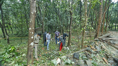 Forensic experts examining the spot where the blast occurred. (Photo | Arun Angela, EPS)