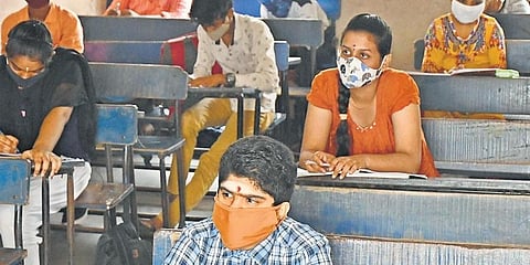 Students of a private school attend a class in Vijayawada. (Photo | EPS)