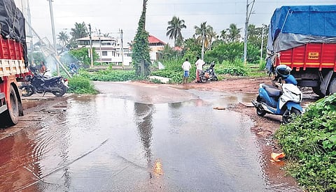 The waterlogged intersection between CBI and Pipeline roads after the pipe burst