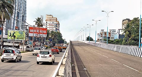 Vehicles move along the service road as the Palarivattom flyover remains closed for traffic. State government has said it will fast-track the reconstruction process | Arun Angela