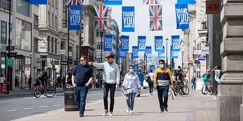 People walk on Oxford Street, in London. (Photo | AP)