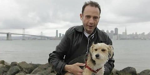 This May 16, 2011 photo shows Timothy Ray Brown with his dog, Jack, on Treasure Island in San Francisco. (Photo | AP)