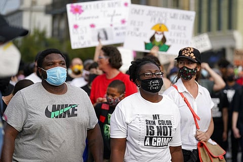 Black Lives Matter protesters march, Friday, Sept. 25, 2020, in Louisville. (Photo  | AP)