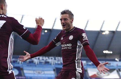 Leicester's Jamie Vardy right, celebrates after scoring his sides second goal during the English Premier League match between Manchester City. (Photo | AP)
