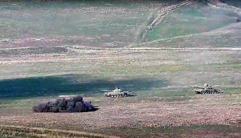In this footage released by Armenian Defense Ministry, Armenian army destroys Azerbaijani tanks at the contact line of the self-proclaimed Republic of Nagorno-Karabakh, Azerbaijan. (Photo | AP)
