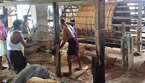 Workers making coir yarn in a coir factory in Alappuzha | Express
