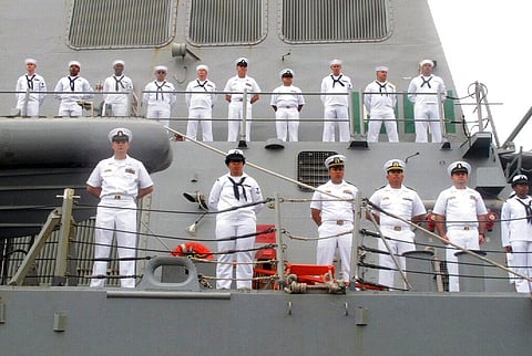 U.S. Navy sailors stand on deck of the guided missile destroyer USS Benfold as it arrives in port in Qingdao in eastern China. (File photo | AP)