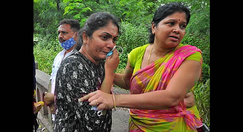 Hemanth’s parents Murali Krishna and Laxmi Rani, along with his wife Avanti, and at the Osmania General Hospital mortuary on Friday | RVK Rao