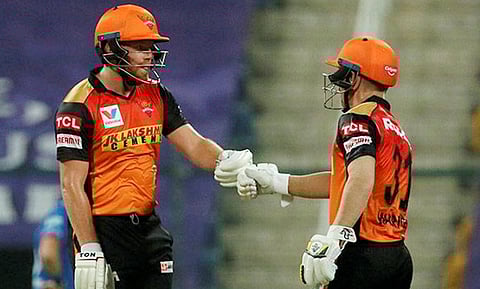 Sunrisers Hyderabad batsmen David Warner and Jonny Bairstow during the Indian Premier League 2020 cricket match against Delhi Capitals, at Sheikh Zayed Stadium, Abu Dhabi. (Photo | PTI)