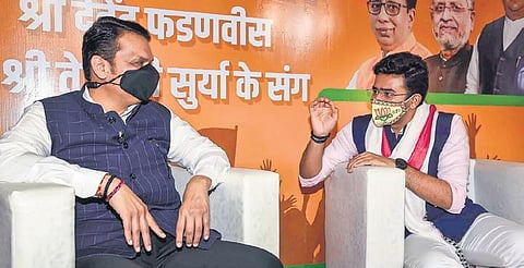 Ex-Maharashtra CM Devendra Fadnavis with BJP leader Tejasvi Surya in Patna. (Photo| PTI)